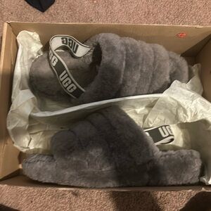 Grey women’s Ugg slippers